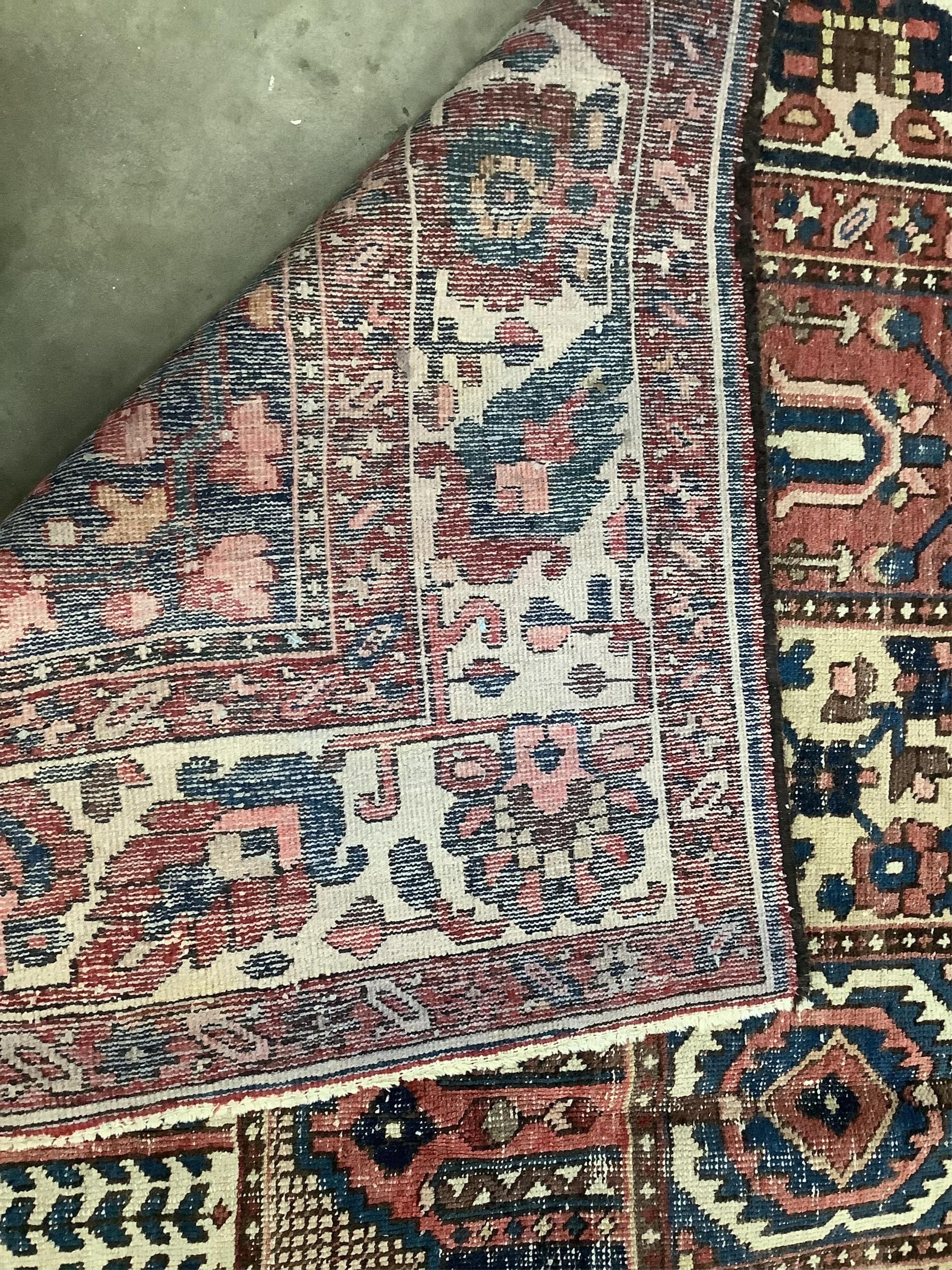 A Baktiari carpet, 320 x 215cm. Condition - poor to fair, worn in several places